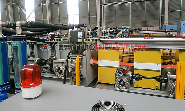 Компания Yuantuo представила систему синхронного привода с двойными прижимными роликами для равномерной и стабильной термообработки профильных труб
