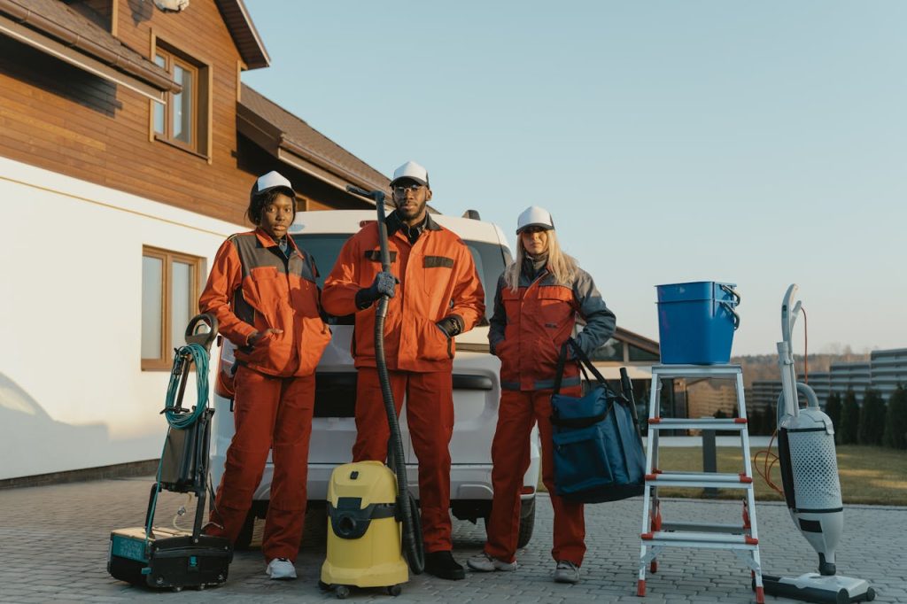 A group of industrial cleaners stand ready to get to work with their equipment