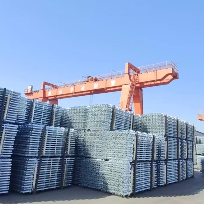 Строительные леса для рулонов стальных труб Tangshan Huaye упакованы и доставлены в Камбоджу, открывая новую главу в зарубежном сотрудничестве