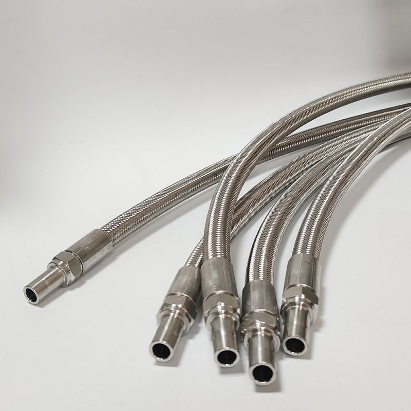 Коррозионностойкий соединительный патрубок из ПТФЭ/ПТФЭ 304 с тефлоновой оплеткой