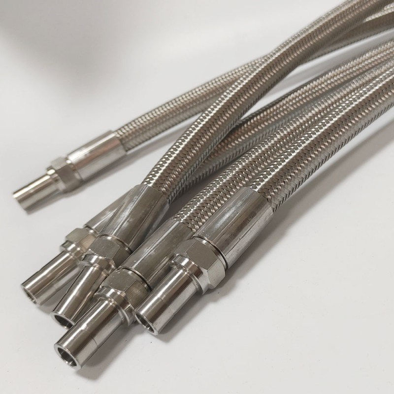 Коррозионностойкий соединительный патрубок из ПТФЭ/ПТФЭ 304 с тефлоновой оплеткой