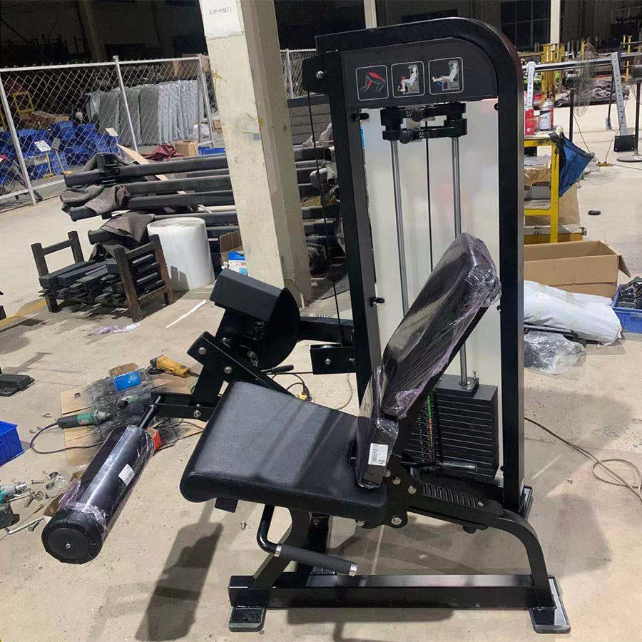 Сидячий тренажёр для разгибания ног: эффективная проработка квадрицепса