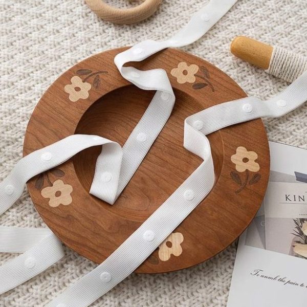 Тесьма с кнопками — удобная застёжка для одежды и аксессуаров